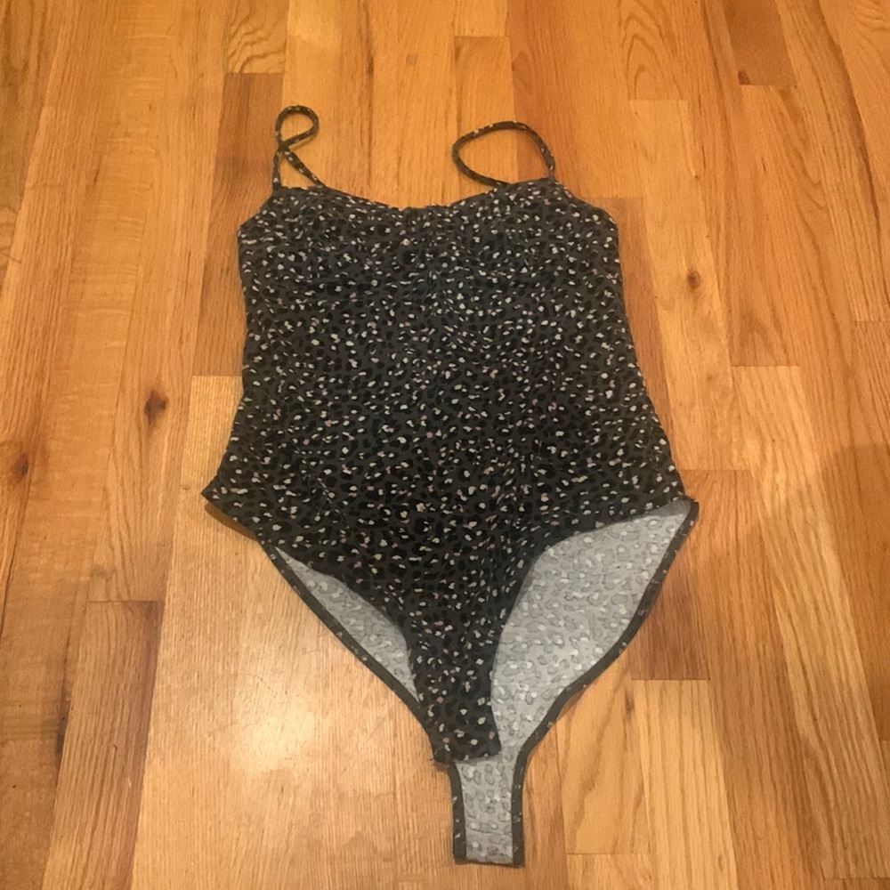 Grey, black, white and pink cheetah print bodysuit